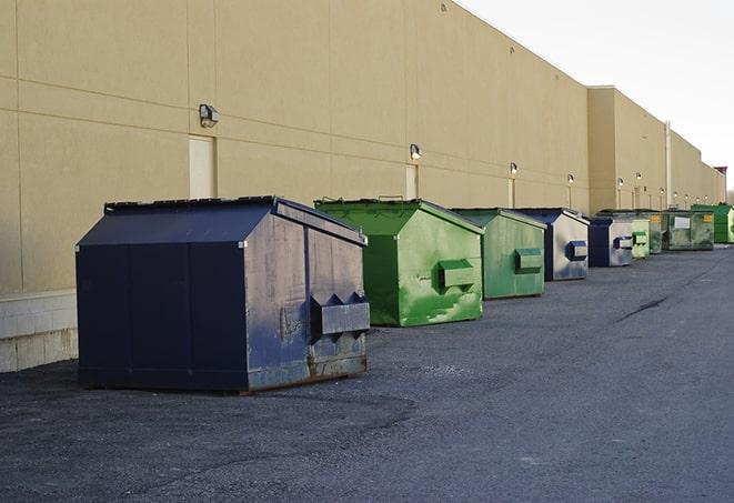 a view of a dumpster truck on a construction site in Bernardsville, NJ